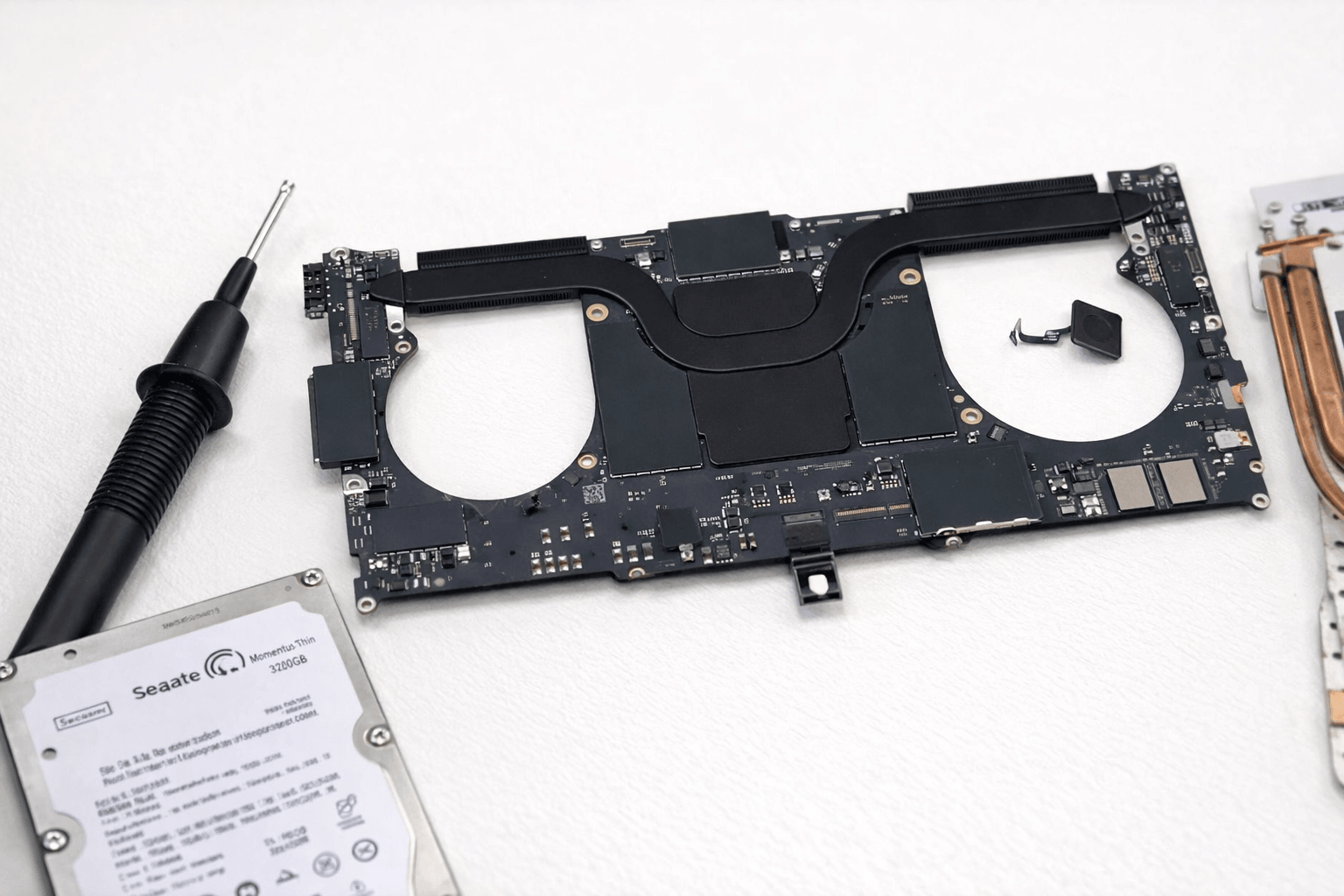 Laptop logic board repair — component-level soldering and diagnostics